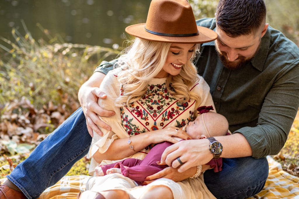 snuggling family, fall family session, warm autumn session, lifestyle newborn session