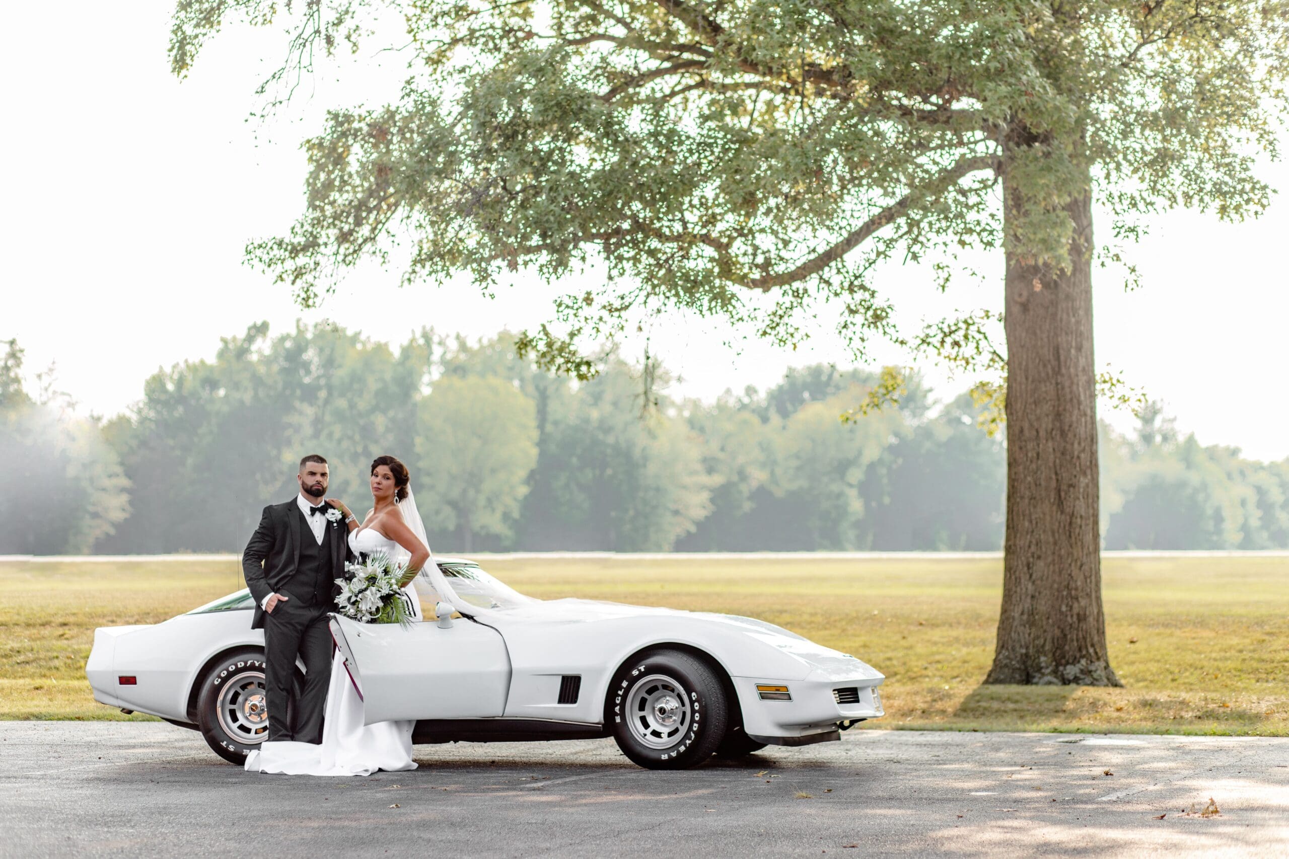 wedding photography, vintage car, corvette, bride and groom, elegant wedding portrait, black and white wedding, corvette stingray wedding, southern illinois wedding photography